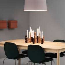 A handmade tea light holder, crafted from a log.i shaped a log from our firewood pile into a slab, and drilled it can be any shape or size you like, as long as it is wide and deep enough to fit a tea light with a little extra on either side, as for length, it could be long enough for. Wooden Candle Holder Lumberjack Normann Copenhagen