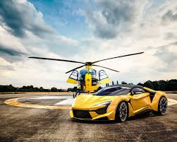 For people who love cars. Download Wallpaper 1280x1024 Car Helicopter Yellow Sportscar Standard 5 4 Hd Background