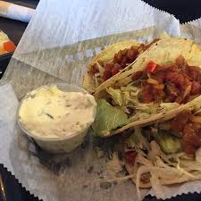 Smoked fish tacos are fun and easy for summertime parties. Caribbean Fish Tacos Jerk Chicken Nachos Picture Of Juan S Flying Burrito New Orleans Tripadvisor
