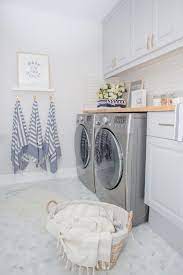 Toronto Based Fashion And Lifestyle Blogger Krystin Writes About The Latest Canadian Trends Street Laundry Room Tile White Laundry Rooms Laundry Room Design