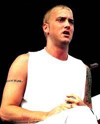Eminem's height is 5ft 8in (173 cm). Eminem Height How Tall