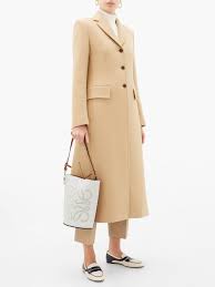 They fit the body perfectly or offer a looser fit for a more raggedy street style appearance. Camel Sua Single Breasted Wool Blend Coat Editorialist