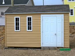 À vous de choisir le type de porte de cabanon. La Quebecoise Ii Garage Et Cabanon Concept
