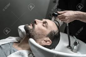 bearded man in the white sink