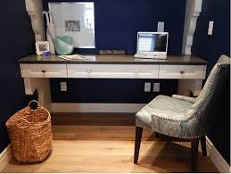 A vintage home office with rich stained furniture, leather chairs, printed curtains, a rug and fabric covered walls. How To Choose Elegant Furniture Style For Home Office Housesit Match