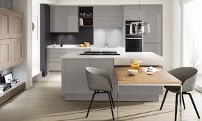 The cool grey is set off by the colourful and inviting green. Remo Silver Grey New Kitchen Range