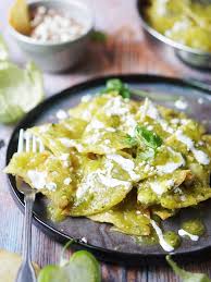 Delicious Chilaquiles Verdes So Easy To Make With Crispy Corn Tortillas In Tomatillo Sauce Th In 2020 Tomatillo Recipes Chilaquiles Verdes Recipe Mexican Food Recipes