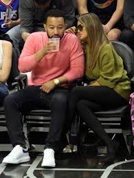 The los angeles lakers courtside nike nba pullover hoodie is super cozy and casual. Chrissy Teigen Sits Courtside In The Sharpest Boots With John Legend Evesham Nj News