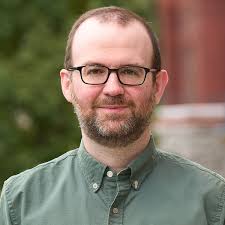 *** White, Associate Professor