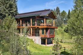 Modern rustic log cabin homes. Modern Rustic Log Cabin Preserves Historic Charm In Steamboat Springs