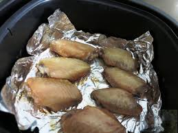 You can put aluminum foil in an air fryer as long as you follow a few tips. Air Fried Honey Chicken Wings Bake Cook Love