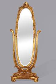 The frame is finished with gold leaf and the mirror is perimeter bevelled. China Antique Gold Dressing Up Oval Shape Framed Standing Mirror C31 China Antique Gold Framed Mirror Dressing Up Mirror