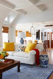 In a decidedly romantic take on french country design, this california living room from courtney at french country cottage features rustic elements like dark wood ceiling beams and is. 11 Charming Living Room Ideas To Inspire You Town Country Living