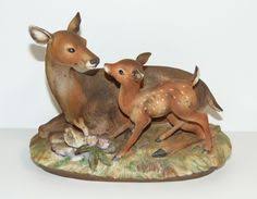 There's a fox, a bear, and a frog, all in cute floral dresses. 43 Figurines Ideas Figurines House Interior Homco