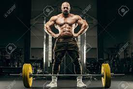 Bodybuilder Handsome Strong Athletic Rough Man Pumping Up Back Muscles  Deadlift Workout Fitness And Bodybuilding Healthy Concept Background -  Muscular Fitness Men Doing Arms Exercises In Gym Naked Torso Stock Photo,  Picture