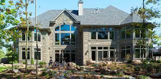 This rustic house plan is great for a sloping lot with its walkout lower level and gives you room for expansion to up to 6 3,248 heated s.f. Walkout Basement House Plans Ahmann Design Inc