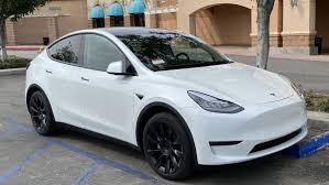 That uses falcon wing doors for access to the second and third row seats. Quick Compare 2020 Tesla Model 3 Vs Model Y After 3 000 Price Cut