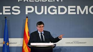 Fugitive Catalan chief Puigdemont pledges to return to Spain if he can be  restored to power