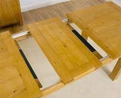 The rectangular table is usually a minimum of 36 inches wide and is the best design for hosting large groups of people. How To Make A Dining Table Bigger For More Diners Frances Hunt