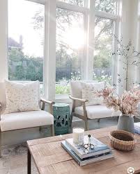 Sunroom Featuring Large Windows Neutral Accent Chairs Wood Coffee Table And Pretty Fall Styling Neutraldecor Sunroom Furniture Small Sunroom Sunroom Designs