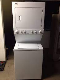 If you are thinking about moving into a tiny house or any other type of small space like a studio you might want to consider a washer dryer combo unit. Large Images For Newer Kenmore 27 Stackable Washer Dryer 116 Laundry Room Storage Stackable Washer And Dryer Laundry Room Storage Shelves