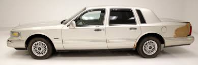 Image result for Light Cypress 1997 Town Car