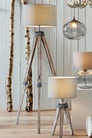 Get Inspired By These Amazing Designs Http Modernfloorlamps Net Lightingde Wooden Tripod Floor Lamp Tripod Floor Lamp Living Rooms Decorative Floor Lamps