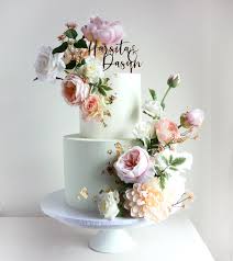 You choose the colors, and we'll pipe a gorgeous floral bouquet all over your cake! Bespoke Wedding Cakes Love Rosie Cakes