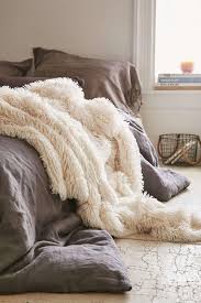 17 Outrageously Cozy Throws To Snuggle Up With Cozy Bedroom Bedroom Design Gray Bedroom