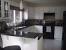White Kitchen Black Stainless Appliances