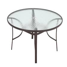 If you like the sturdy build of metal, aluminum is a fair substitute. Garden Ripple Round Table With Umbrella Hole Or 4 6 Stacking Chairs Living And Home