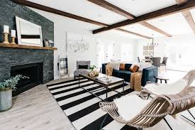 Here's my vintage modern rustic living room where we spend most of our time. Rustic Modern Living Room With Exposed Beams Hgtv