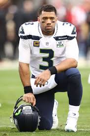 Russell carrington wilson was born on november 29, 1988 in cincinnati, ohio & raised in richmond, virginia. Russell Wilson Of The Seattle Seahawks Kneels On The Field After A Seattle Seahawks Russell Wilson Seahawks