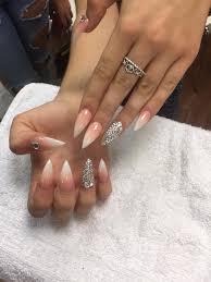 Stiletto nails are all the rage at the moment with bold there is no need to wonder how to do ombre nails anymore! L A Nails French Ombre Stiletto Nails With Diamonds Xx Facebook