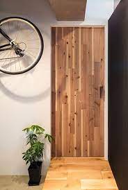 p ワイルドな表情の引き戸は 普通のフラッシュドアに薄くスライスした足場板を貼ったもの インパクトあります p フラッシュドア 引き戸 ドア