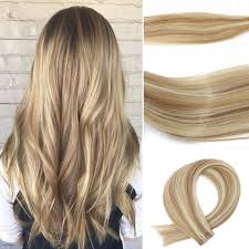 Honey blonde hair is a blend of dark and warm blonde with light brown. Amazon Com Tape In Hair Extensions 7a Two Tone Colored Hair Bleach Blonde Color 613 Highlighted With Light Golden Brown Glue In Extensions Human Hair Color 12 16inche 30g 20pcs 12p613 Beauty