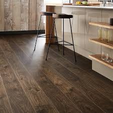 Moreover, the unique top layer makes our floor highly resistant to scratches and stains. Quick Step Livyn Dark Brown Oak Vinyl Flooring 2 10sq M Howdens Vinyl Flooring Luxury Vinyl Flooring Luxury Vinyl Plank Flooring