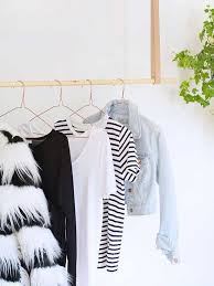 How to build a rack to hang clothes on. 8 Ways To Style A Clothing Rack Hanging Clothes Racks Clothes Rail Clothing Rack