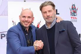 John Travolta Dances Onstage With Pitbull During Premio Lo Nuestro People Com