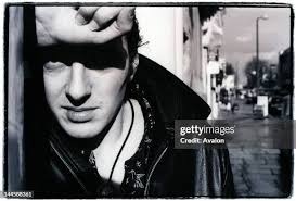 Nick Sheppard and Paul Simonon of The Clash perform