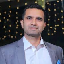 Myself lighting JPF lamp of wisdom with Mr R K Damani, Chairman