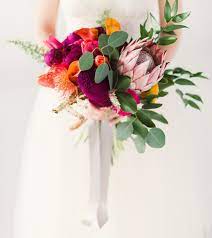 All of these tropical leaf wedding bouquets can inspire your own arrangement. Modern Tropical Wedding Inspiration Tropical Wedding Bouquets Tropical Wedding Tropical Wedding Inspiration