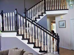 Black White Staircase With Gray Walls In The Living Room Blue Accent Walls White Staircase Black Stairs