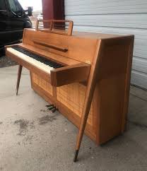 The back side of the piano is fully finished with walnut and caned panels so it can be placed anywhere in a room, small in size, big in personality and sound. Rare Baldwin Acrosonic Danish Modern Style Spinet Piano Walnut And Cane At 1stdibs