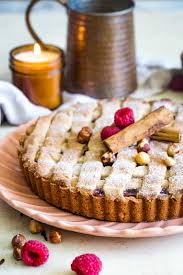 Linzer Torte On Plate With Candle In Background Sweets Recipes Linzer Torte Linzer Torte Recipe
