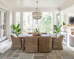In this dining sunroom design where the use of wood is preferred on all surfaces such as windows, door joinery, floor covering, ceiling, and wall covering, the dining table used in the space is emphasized by choosing dark colors. Sunken Sunroom Dining Room Design Ideas