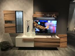 A bulky sofa can eat up living room space quickly, so if you have an especially tiny room, ask yourself if you could manage with an equally comfy but far less invasive 'snuggler' or 'loveseat'. Modern Living Room Wall Units Full Of Class And Pizzazz