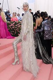 How will lady gaga top four outfits and a show? Gigi Hadid Channels The Ice Queen At The Met Gala