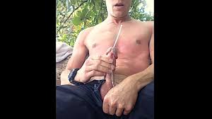 Pissing swim trunks and a public beach cumshot in Costa Rica