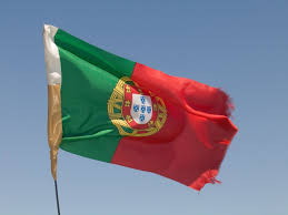 Bandeira de portugal) is a rectangular bicolour with a field divided into green on the hoist, and red on the fly.the lesser version of the national coat of arms (armillary sphere and portuguese shield) is centered over the colour boundary at equal distance from the upper and lower edges. Stock Photo Bandeira Portuguesa Gratis Freeimages Com